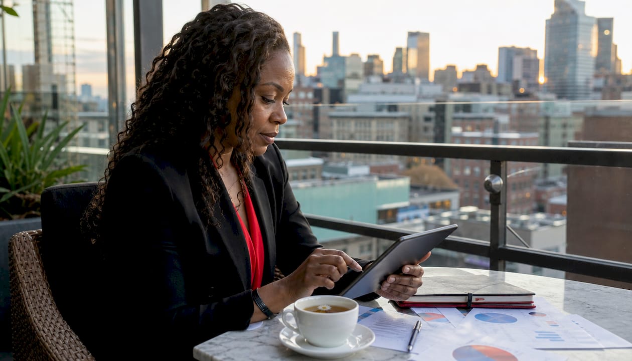Consultant using tablet in coworking space
