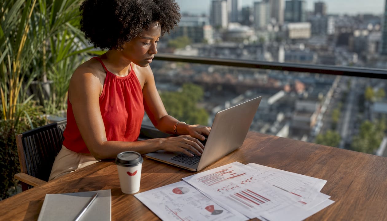 Woman working on affiliate marketing reports