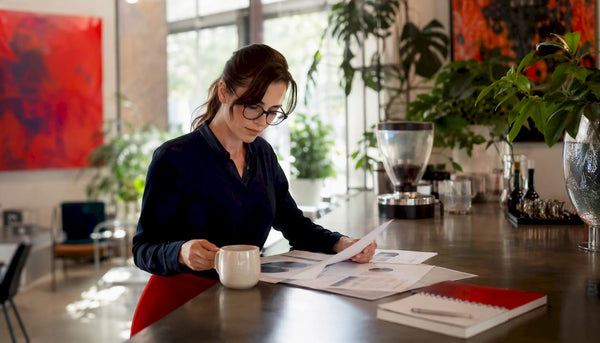 Marketing manager analyzing customer lifetime value data