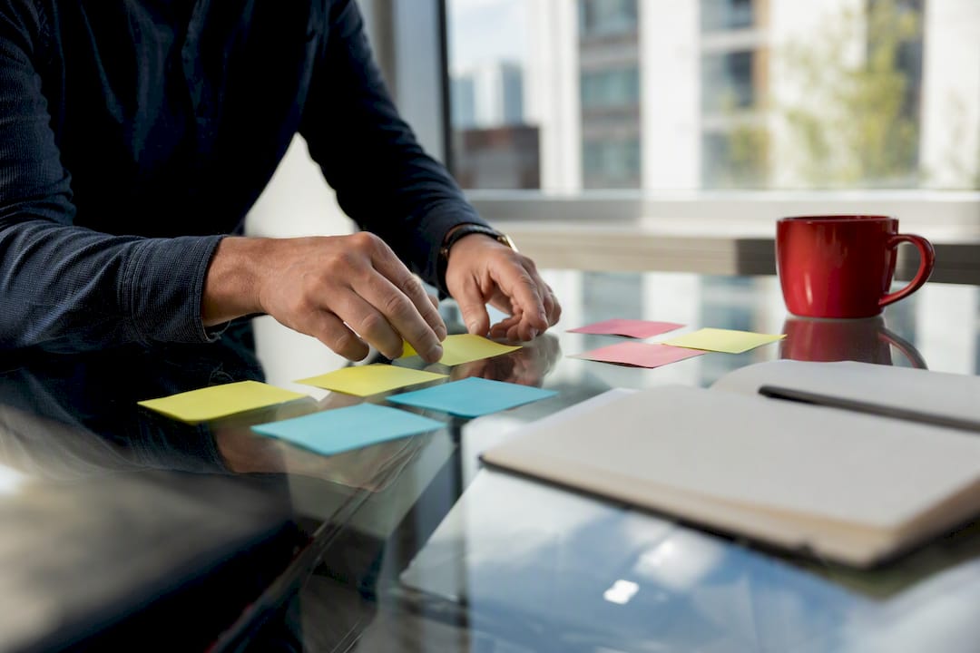 Hands adjusting marketing funnel diagram